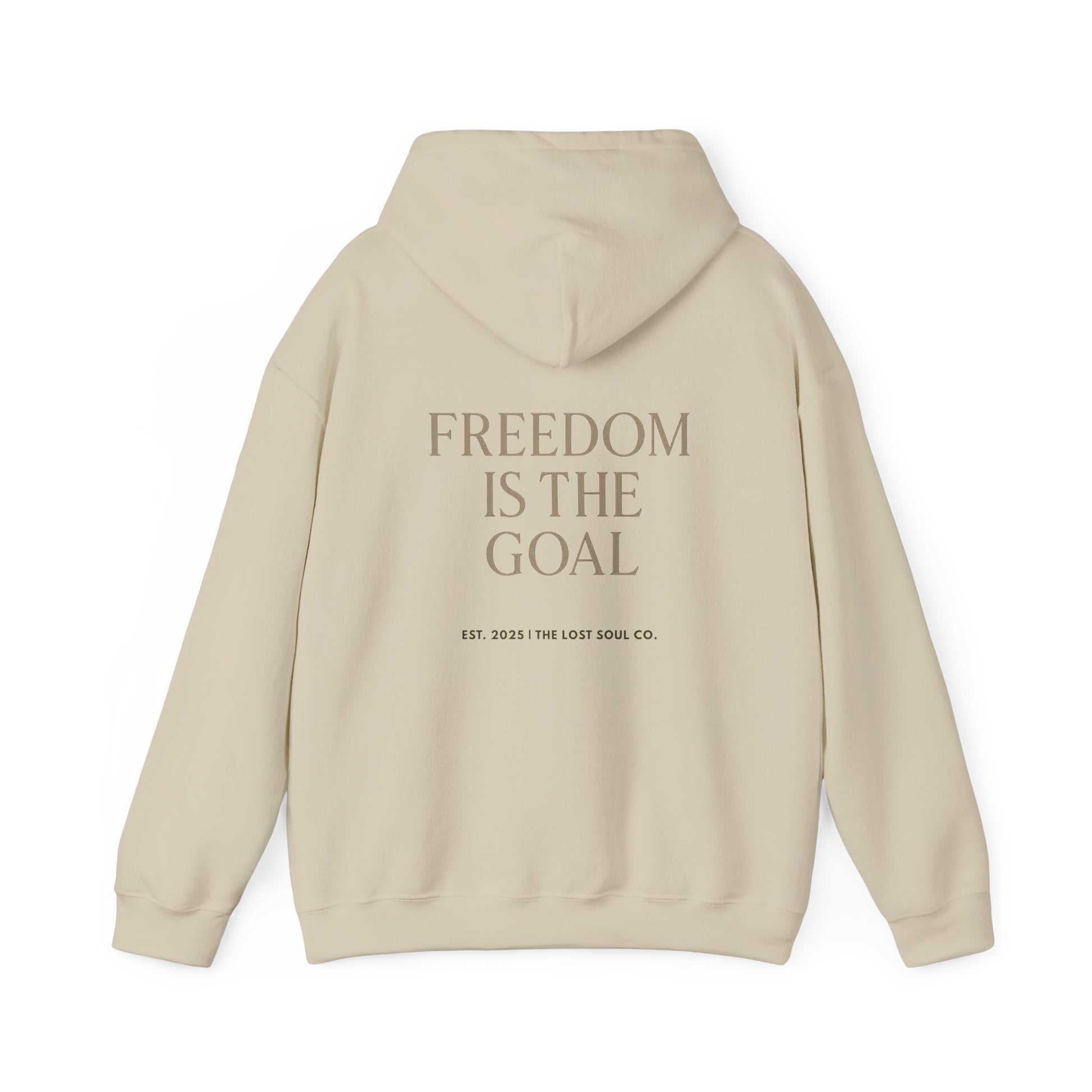 Back view of sand hoodie with serif quote “FREEDOM IS THE GOAL” center-aligned – The Lost Soul Co.