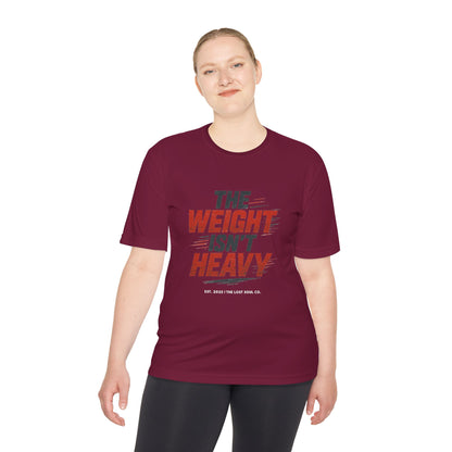 Person wearing cardinal athletic tee with bold red slanted “THE WEIGHT ISN’T HEAVY” graphic and The Lost Soul Co. branding
