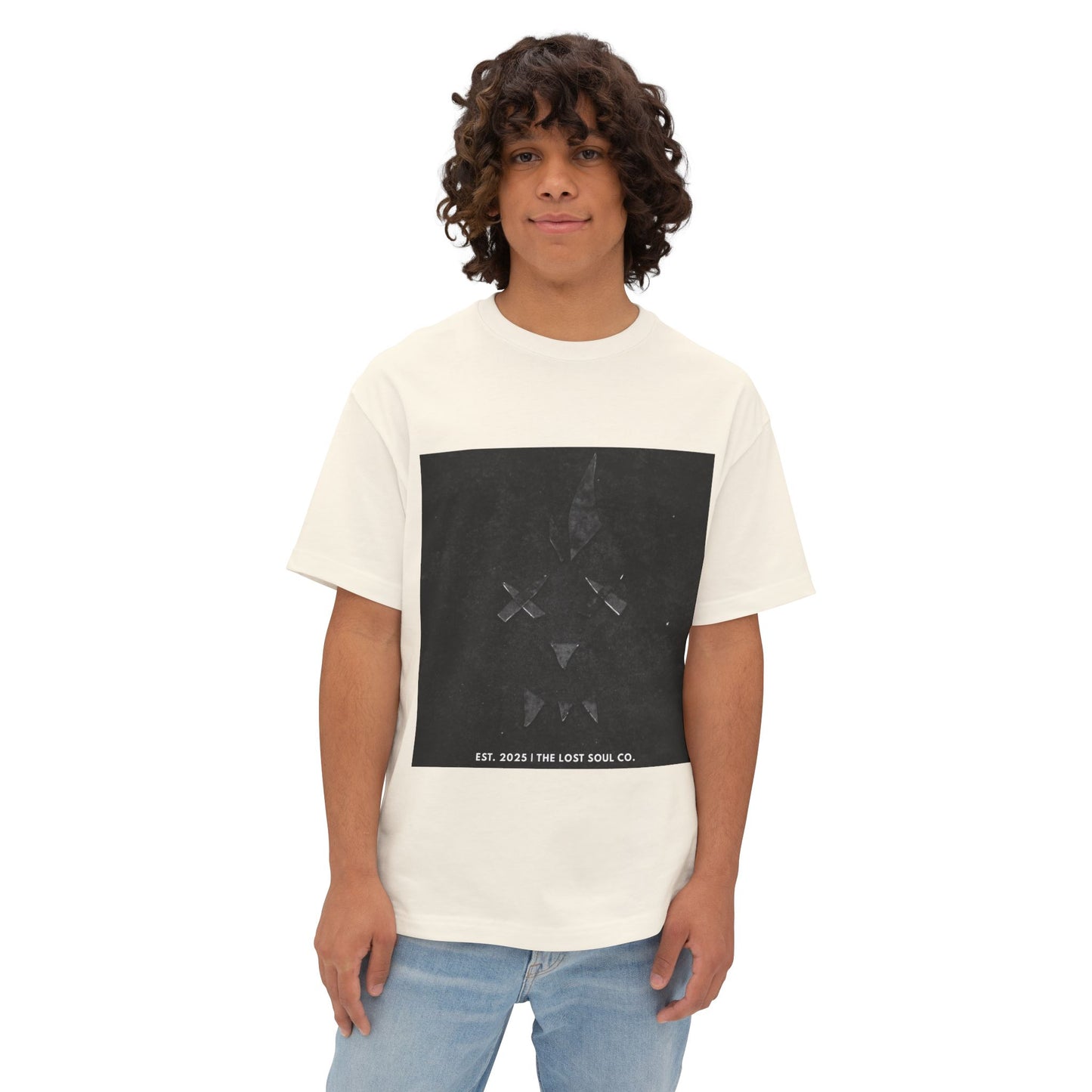 Model wearing Broken Face oversized boxy tee in Natural– front view.