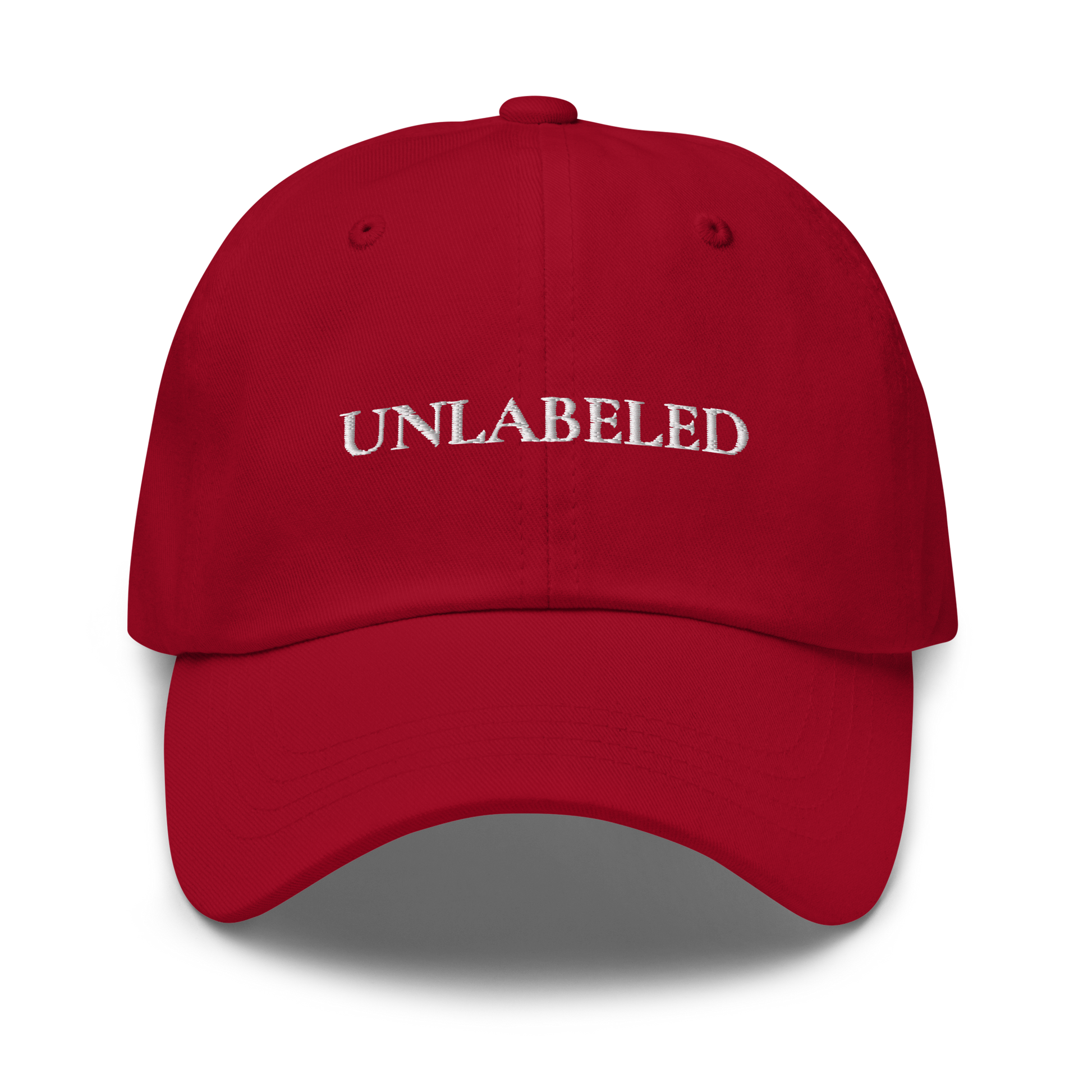 Red cap with 'UNLabeLED' serif text - The Lost Soul Co.