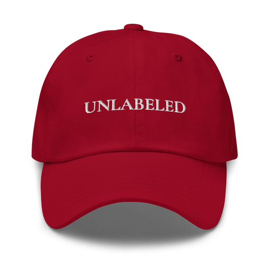 Red cap with 'UNLabeLED' serif text - The Lost Soul Co.