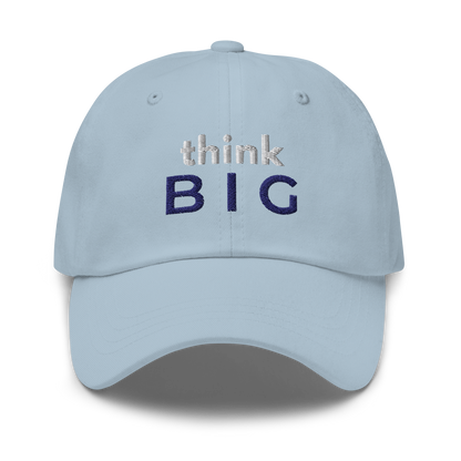 Light blue dad hat with embroidered text “think BIG” in navy and white, minimal motivational streetwear style by The Lost Soul Co.