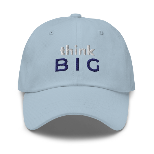 Light blue dad hat with embroidered text “think BIG” in navy and white, minimal motivational streetwear style by The Lost Soul Co.