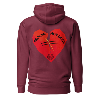 Broken but not done Premium Hoodie