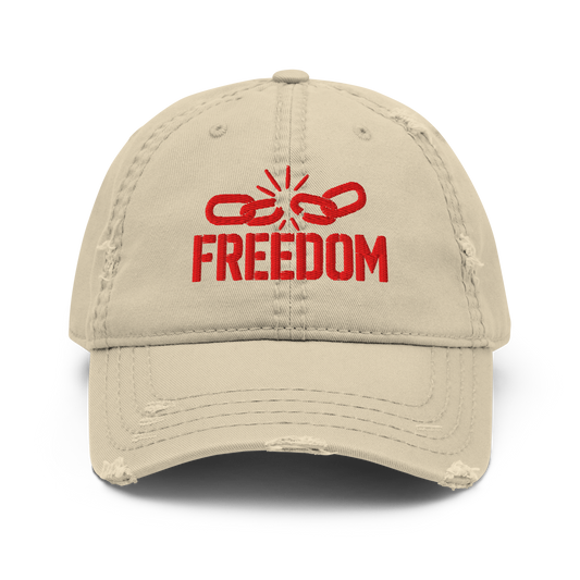 Distressed dad hat with embroidered broken chain and “FREEDOM” text on the front— premium streetwear cap by The Lost Soul Co.