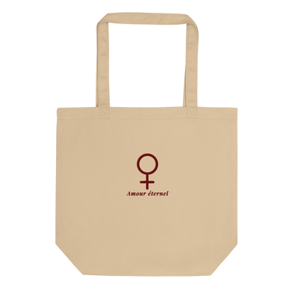 Organic cotton eco tote bag in oyster color featuring a maroon embroidered Venus symbol and the words “Amour éternel” in elegant italic typography. | The Lost Soul Co.