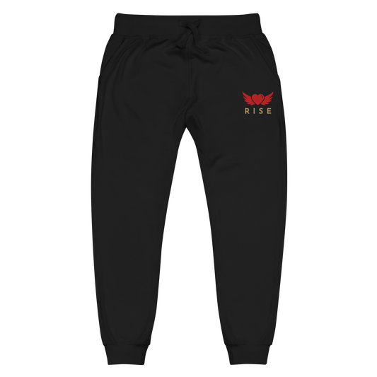 Black jogger pants with winged heart with the subtle text underneath  'RISE' - The Lost Soul Co.